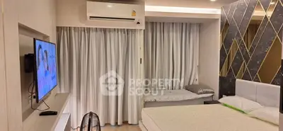 Modern bedroom with air conditioning and stylish decor