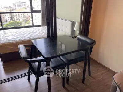 Modern living room with large windows and stylish furniture