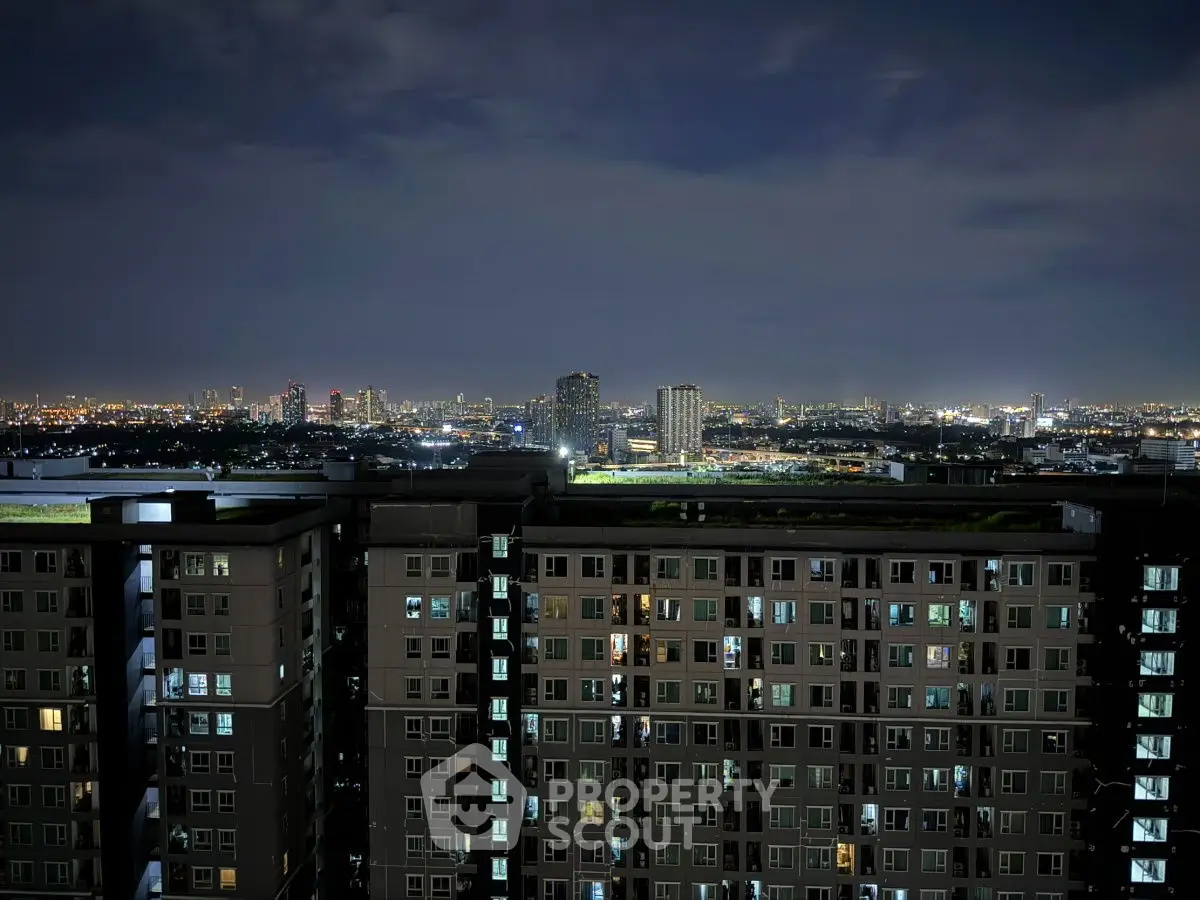 Stunning night view of city skyline from high-rise apartment building