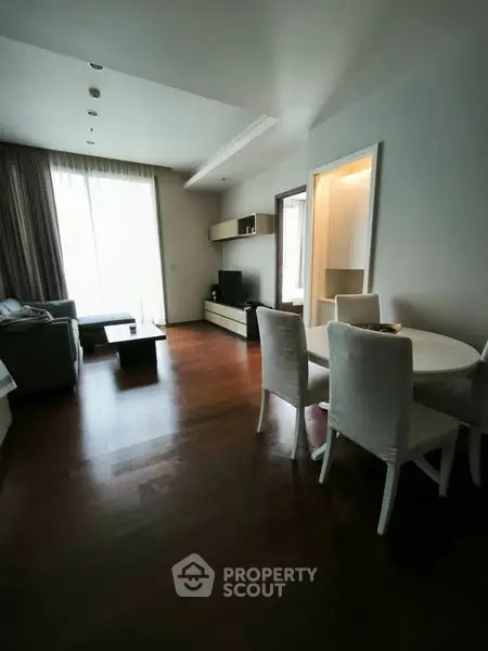 Spacious living room with modern furniture and natural light