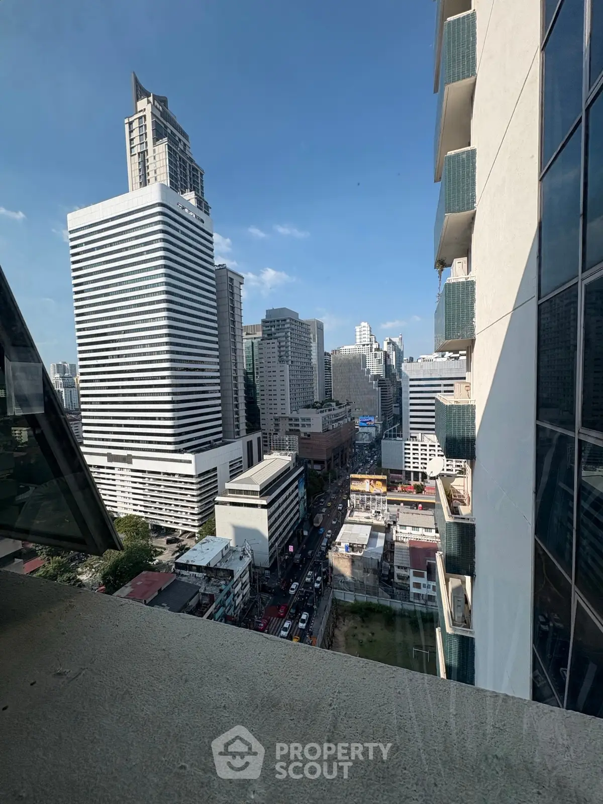 Stunning urban cityscape view from high-rise building balcony