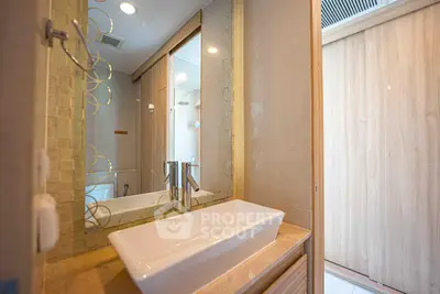 Modern bathroom with elegant sink and stylish mirror design