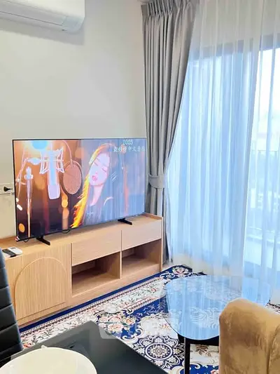 Modern living room with stylish TV setup and elegant decor