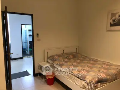 Cozy bedroom with modern decor and inviting atmosphere