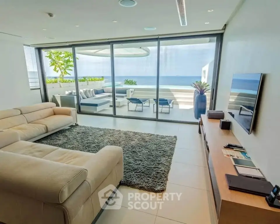 Luxurious living room with ocean view and modern decor