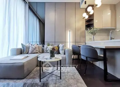 Modern living room with stylish decor and open kitchen layout