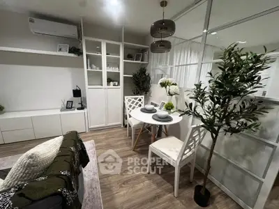 Modern living room with dining area, featuring stylish decor and cozy ambiance.