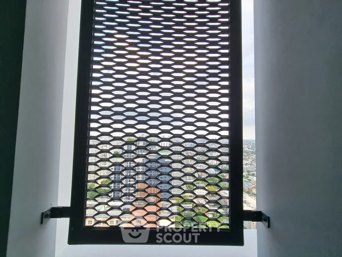 Stunning city view through modern architectural window grille