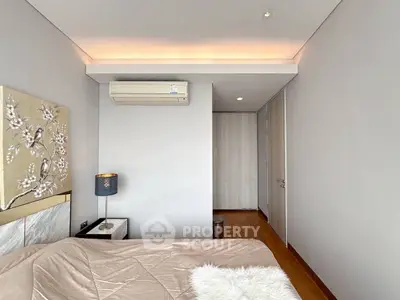 Modern bedroom with stylish decor and cozy ambiance