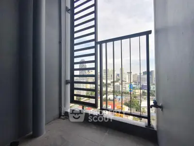 Urban balcony with city skyline view, perfect for enjoying the vibrant cityscape.