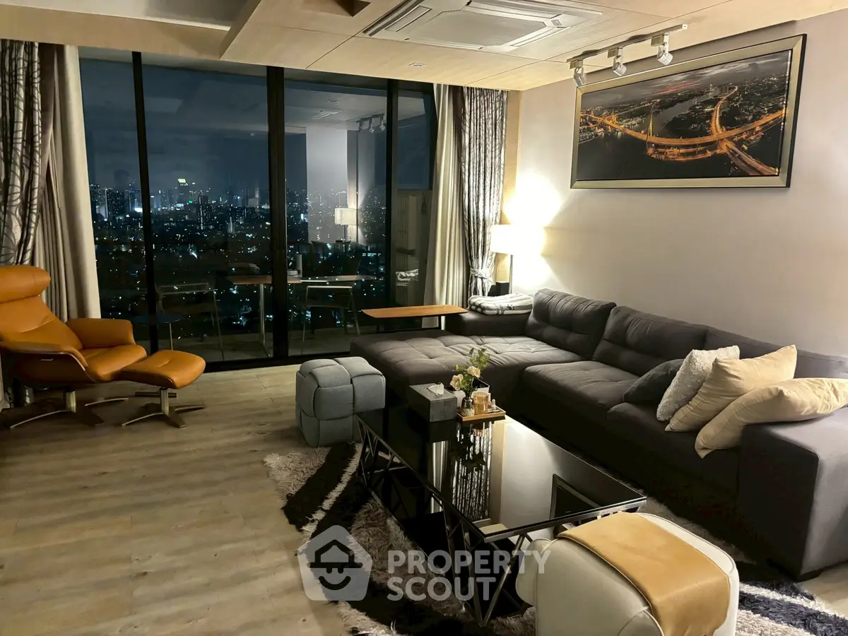 Luxurious living room with stunning city view, modern furniture, and elegant decor for ultimate comfort and style.