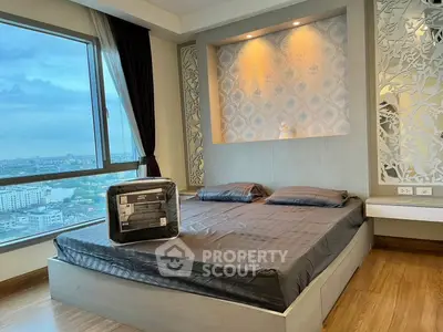 Luxurious bedroom with stunning city view and elegant decor