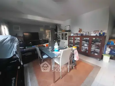 Spacious living room with modern furniture and ample natural light