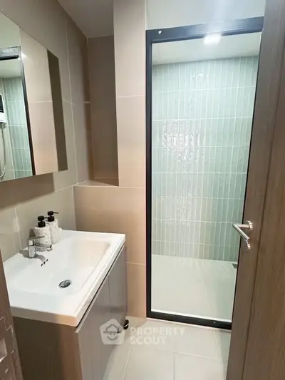 Modern bathroom with sleek design and glass shower enclosure
