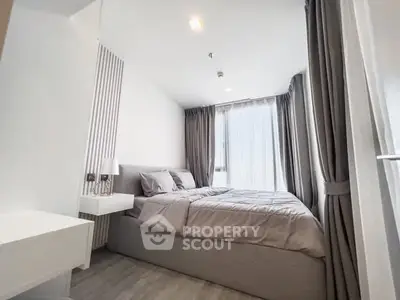 Modern bedroom with elegant decor and natural light