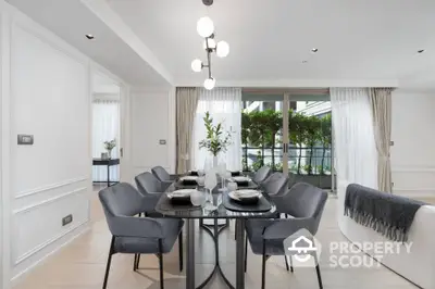 Elegant dining room with modern decor and garden view, perfect for entertaining guests.