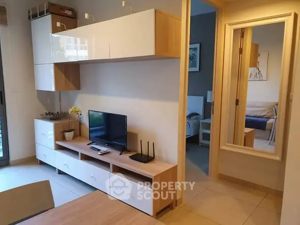 Modern living room with sleek furniture and open layout design