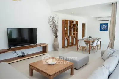 Spacious modern living room with elegant dining area and stylish decor