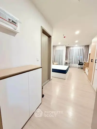 Modern studio apartment with open layout and stylish furnishings