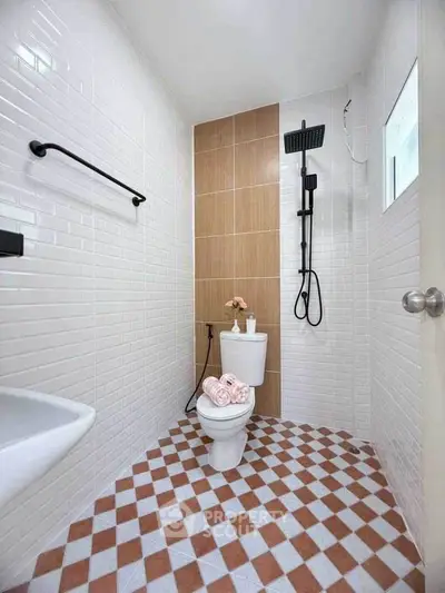 Modern bathroom with stylish tiles and sleek shower design