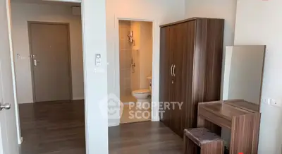 Modern apartment interior with wooden furniture and bathroom view