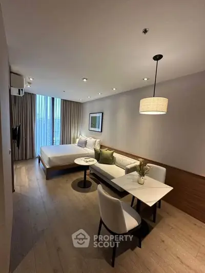 Modern studio apartment with stylish decor and natural light
