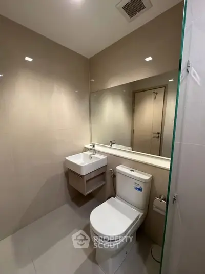 Modern bathroom with sleek fixtures and minimalist design