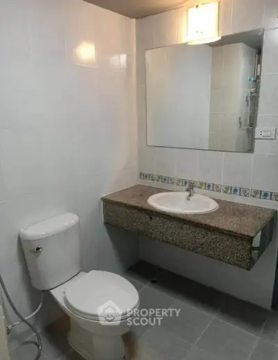Modern bathroom with sleek fixtures and elegant tile design