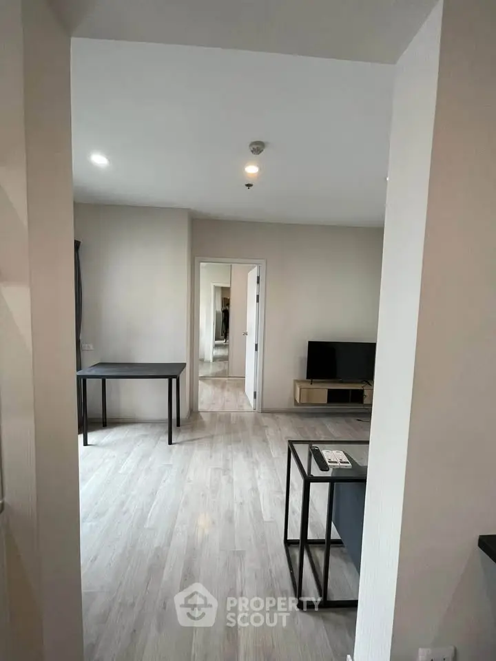 Modern apartment interior with sleek furniture and open layout, perfect for urban living.