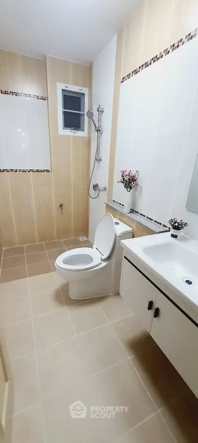Modern bathroom with sleek fixtures and elegant tile design