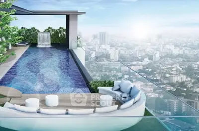 Luxurious rooftop pool with stunning city view and modern seating area.