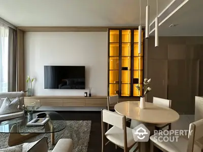 Elegant living room with modern furnishings, ambient lighting, and a sleek entertainment unit, perfect for upscale urban living.