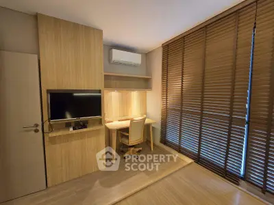 Modern study room with wooden decor and natural light