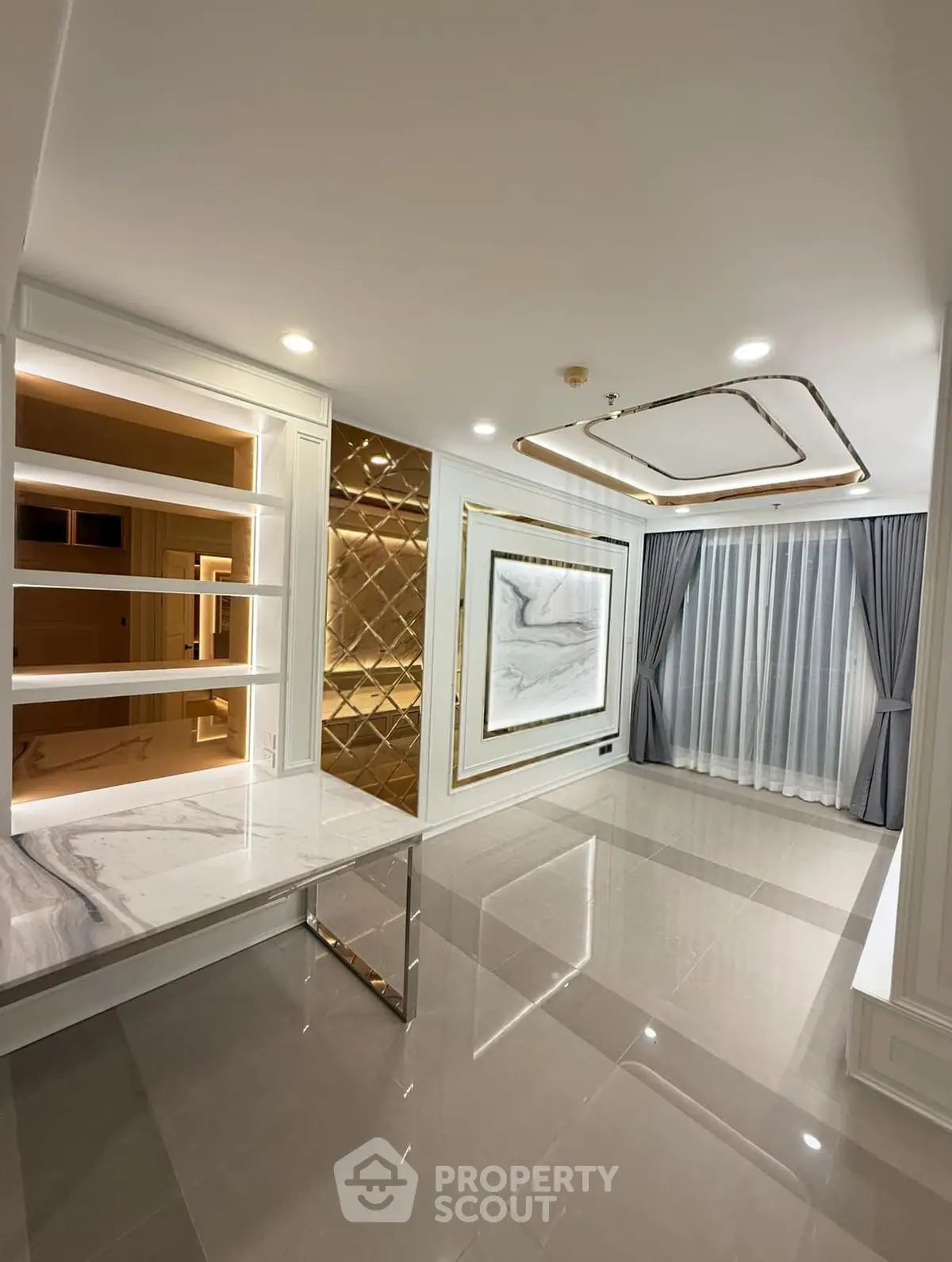 Luxurious modern living room with elegant marble accents and stylish lighting