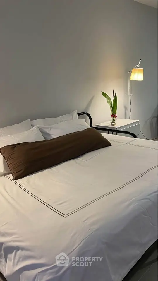 Cozy bedroom with modern decor and ambient lighting