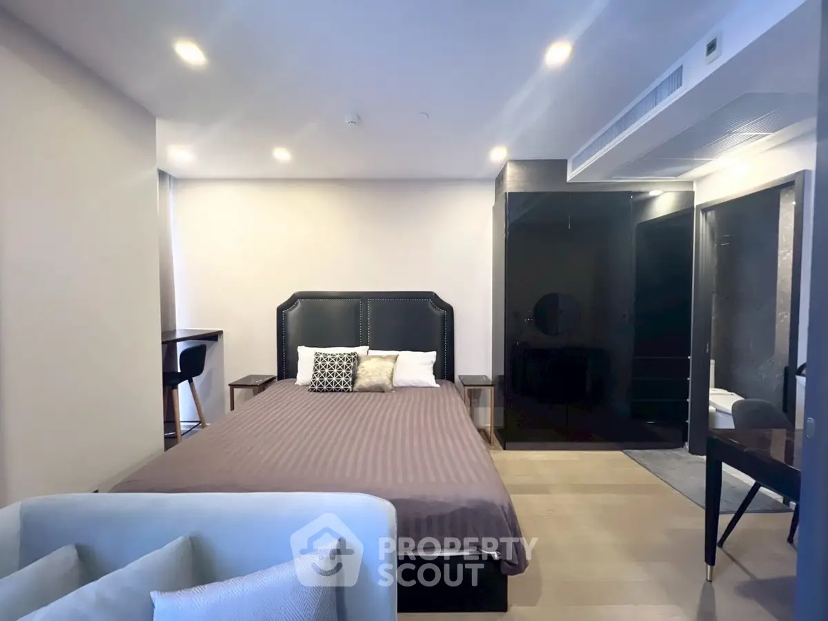 Modern bedroom with stylish decor and cozy ambiance