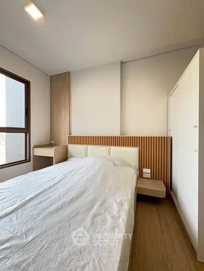 Modern bedroom with minimalist design and natural light