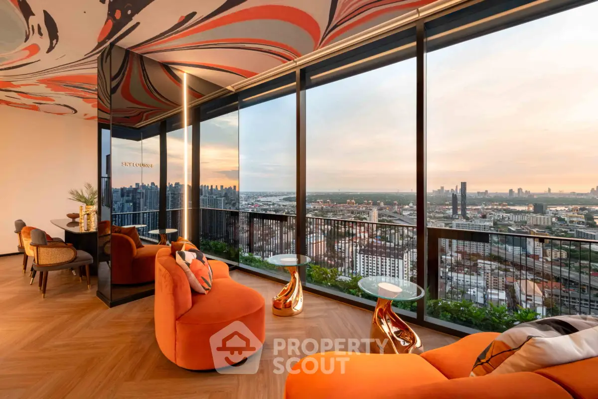 Luxurious living room with panoramic city views and modern orange decor