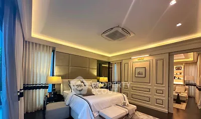 Luxurious bedroom with elegant decor and ambient lighting