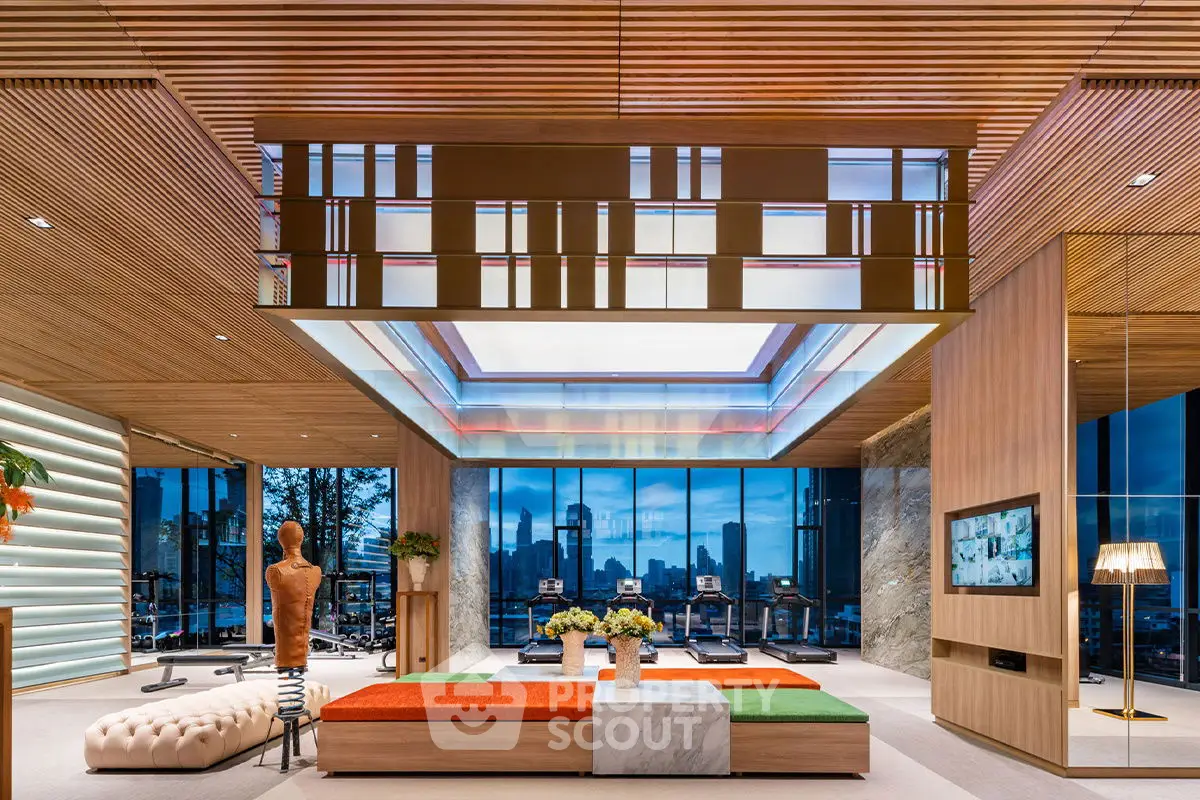 Luxurious modern living room with city skyline view, stylish decor, and unique ceiling design.