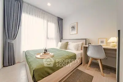 Modern bedroom with stylish decor and natural light