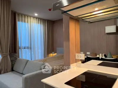 Modern studio apartment with cozy living area and stylish kitchen