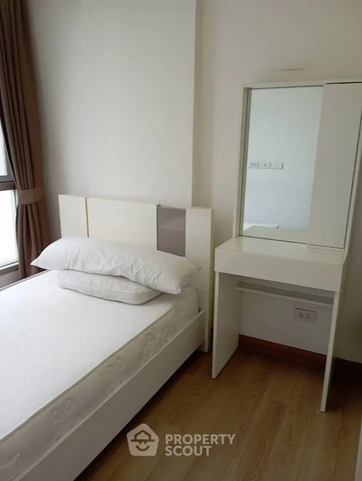 Cozy bedroom with modern furniture and natural light