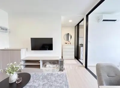 Modern living room with sleek TV setup and stylish decor