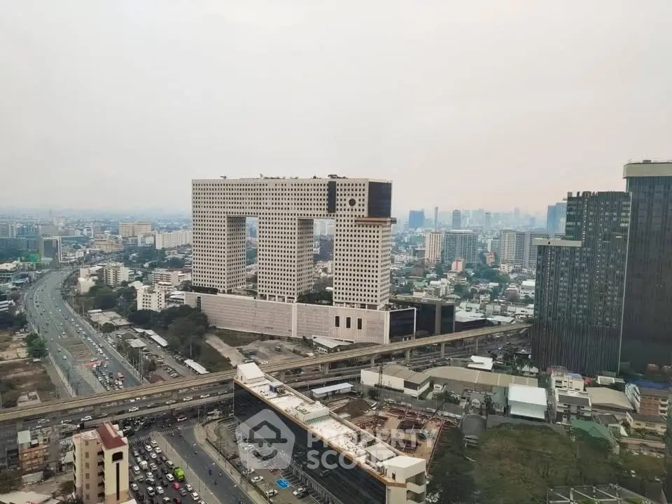 Stunning aerial view of a unique architectural building in a bustling cityscape.