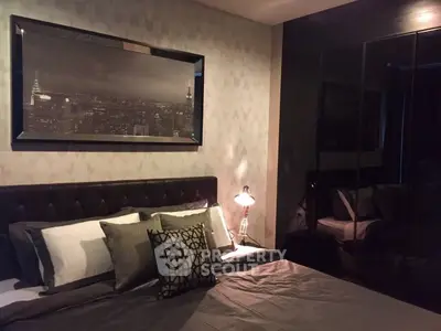 Luxurious bedroom with elegant decor and cityscape artwork