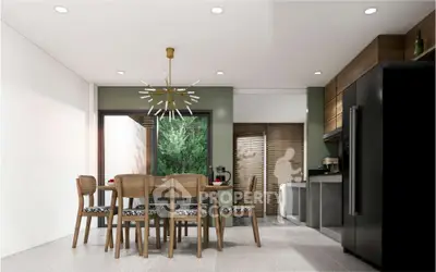 Modern kitchen with dining area, sleek black appliances, and stylish lighting