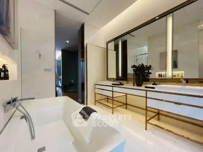 Luxurious modern bathroom with elegant fixtures and spacious design