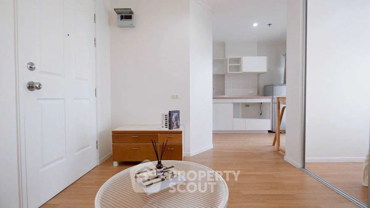 Modern apartment interior with wooden flooring and minimalist decor