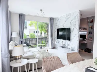 Modern living room with marble accent wall and large window view
